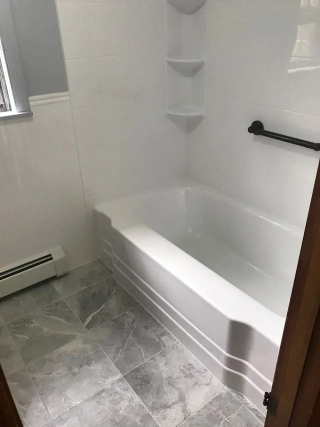 Classic bathtub liner over cast iron with acrylic walls in Halifax